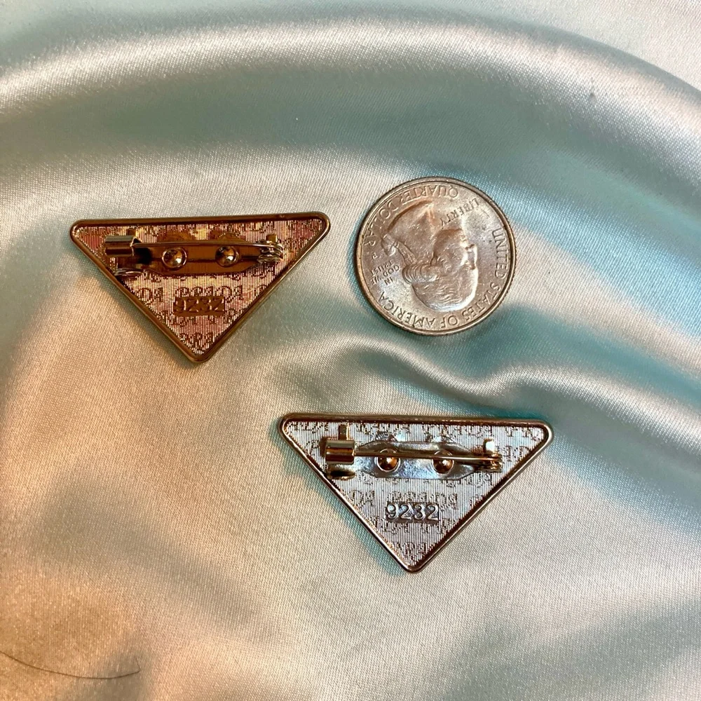 Prada Unisex ivory triangle logo Pin Clip upscaled - Picture 2 of 5